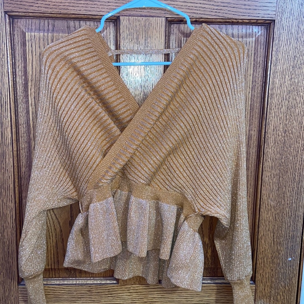 Knotted plain knit sweater
